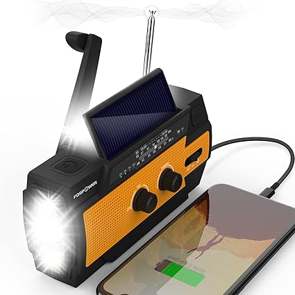 FosPower Radio de Emergencia Portátil con Manivela/Carga Solar 4000mAh (Modelo A3) Batería Externa con SOS Alarm, LED Flashlight, Am/FM por Senderismo y al Aire Libre (Naranja)